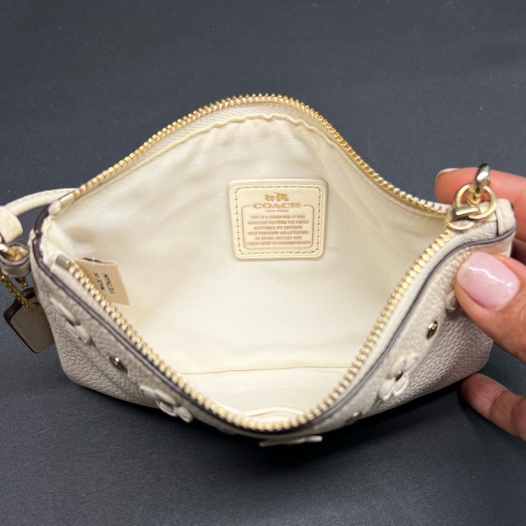 EUC COACH Dahlia Floral Rivets Wristlet - Picture 2 of 6